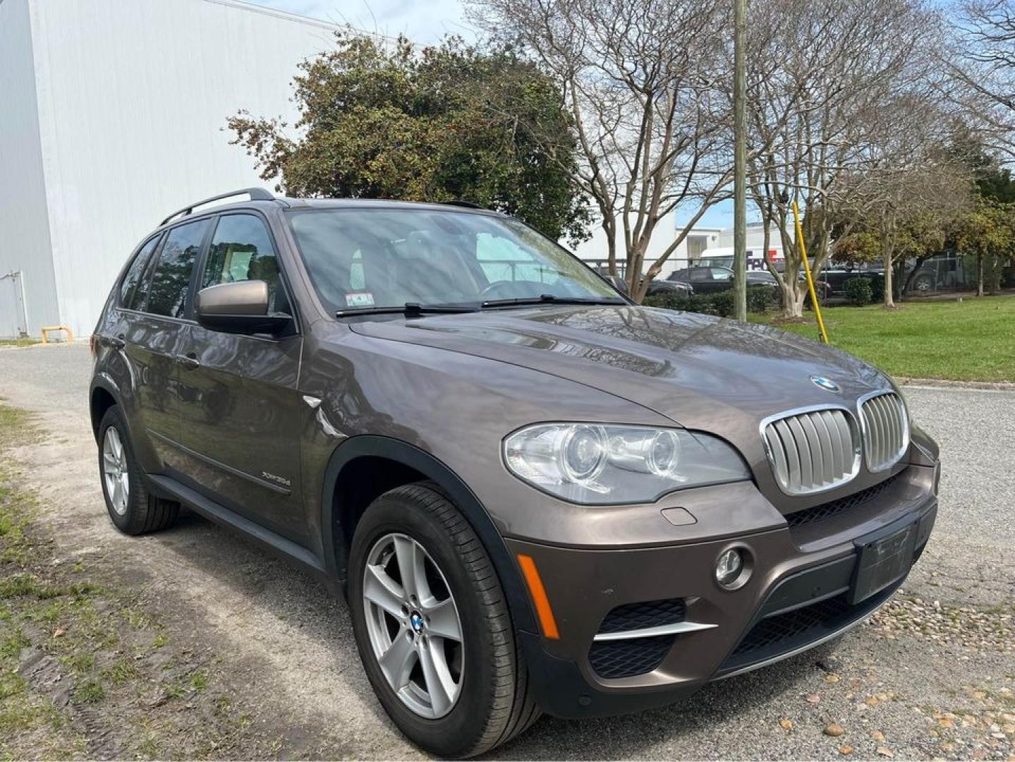 2012 Brown /Tan BMW X5 xDrive 35D (5UXZW0C59CL) with an 3.0 M57 i6 engine, 6 Speed Auto transmission, located at 5700 Curlew Drive, Norfolk, VA, 23502, (757) 455-6330, 36.841885, -76.209412 - Photo#1